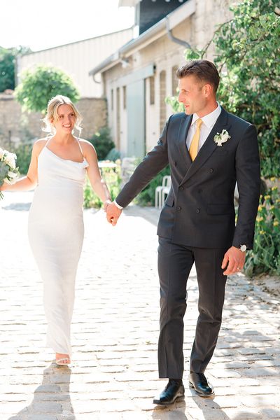 pregnant-bride-with-groom-at-chateau-de-cormicy-wedding