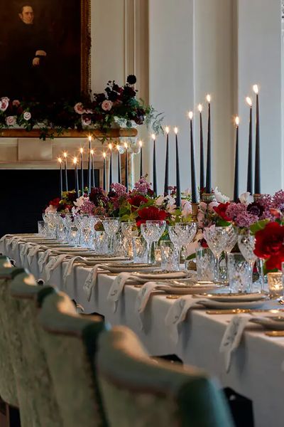 The Ned wedding reception table decor, including flowers and candles