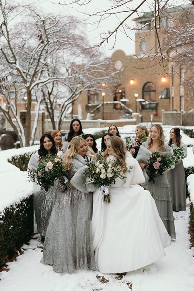 winter-wedding-with-silver-bridesmaid-dresses-and-bride-in-princess-wedding-dress