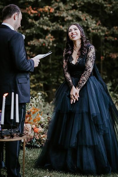 Bride wearing a black tulle layered wedding dress for New York for gothic wedding 