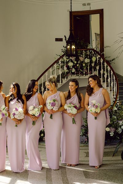 bridesmaids-wearing-lilac-bridesmaid-dresses