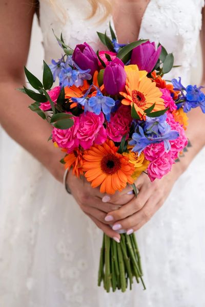 Colourful bridal bouquet by Capture House Photography