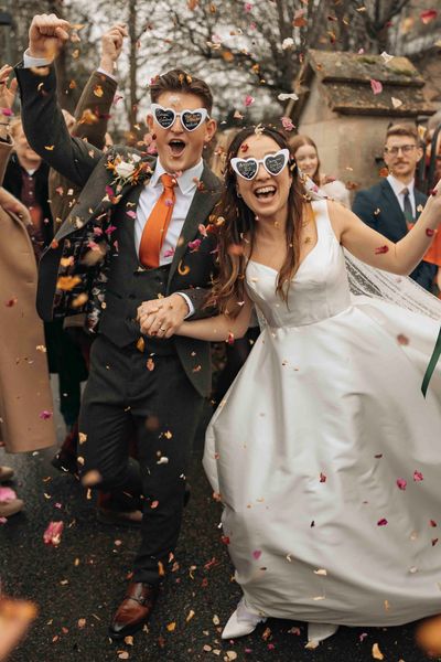 Bride and Groom Confetti photo after their Ceremony - by Ben Atkins Photography