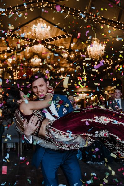 Anglo Indian Fusion Wedding for 200 guests at Wharfedale Grange, Yorkshire. Bride wears a traditional Lengha. Photography by Kazooieloki.