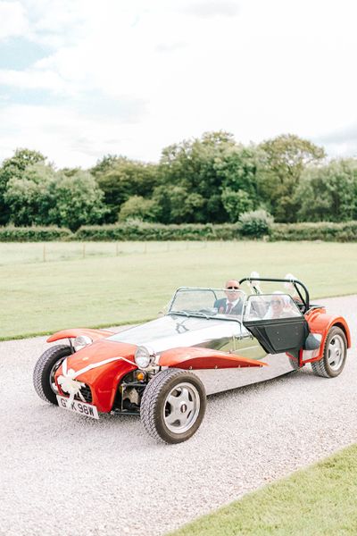 Hazel Gap Barn Wedding with Bride Arriving by Kit Car | Sassi Holford Wedding Dress | Valentino Rockstud Heels | Sarah-Jane Ethan Photography