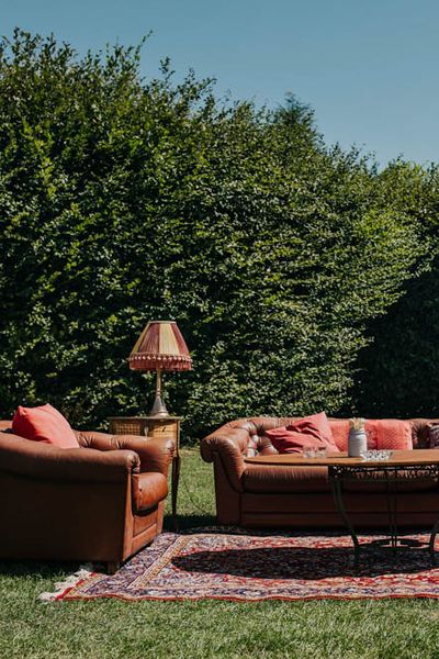 Outdoor Seating Area and Macaroon Tower at French Chateau Wedding in the Dordogne with Bride in Pronovias, Shot by Lush Imaging