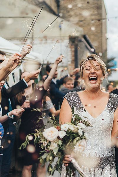 Metallic Confetti Cannons and Paper Lanterns with Bride in Beaded Shoulder Eliza Jane Howell Dress for Stoke Newington Wedding, shot by Miss Gen Photography