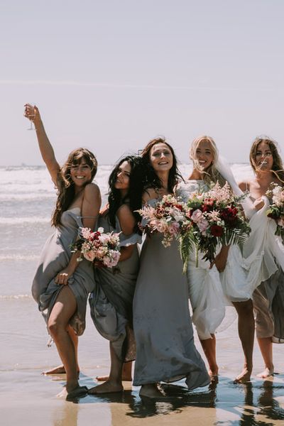 Mykonos Rewritten Bridesmaid Dresses for an Epic Clifftop Coastal Wedding with Bride in Grace Loves Lace Inca Gown, shot by Nic Ford Photography