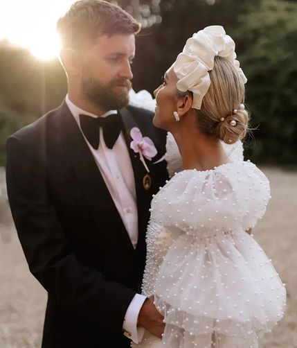 bride and groom at goldne hour for top real weddings of 2024