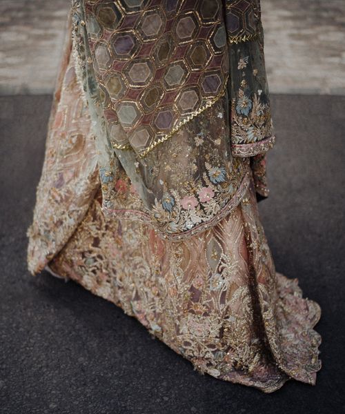 Pastel Bengali wedding dress and veil with gold thread geometric design for intimate Asian wedding