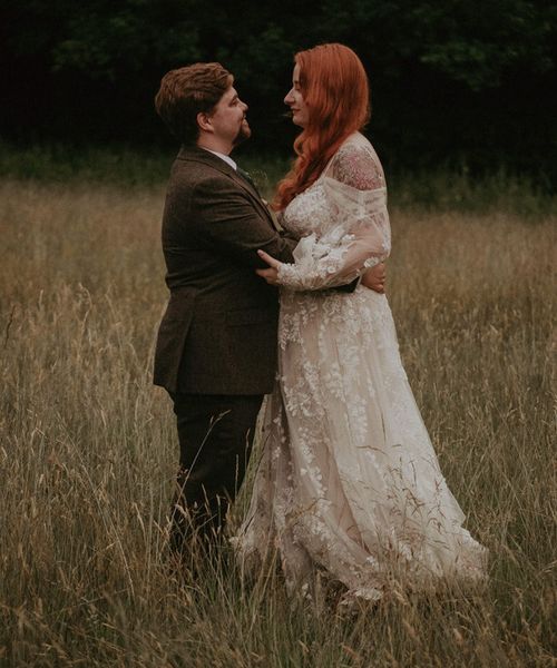 Lila's Wood outdoor wedding with the bride in boho lace wedding dress and groom. 