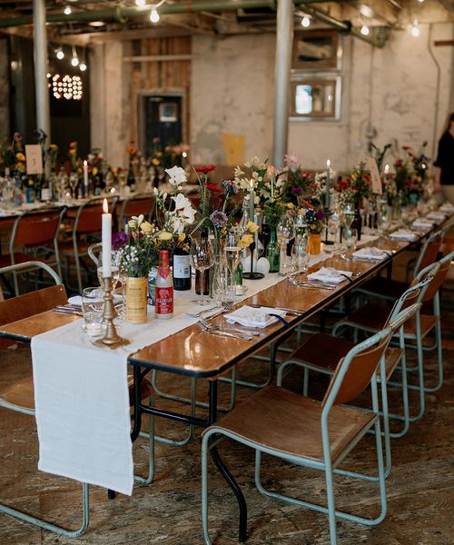 Wildflower wedding theme at Holmes Mill wedding with botanical tablescape.