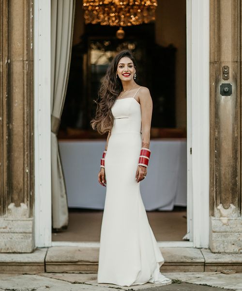 Classic Hinwick House country house wedding with the bride wearing a slip wedding dress