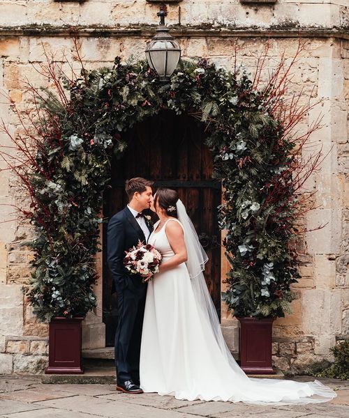 Notley Abbey Wedding With Burgundy Bridesmaid Dresses & Flower Arch