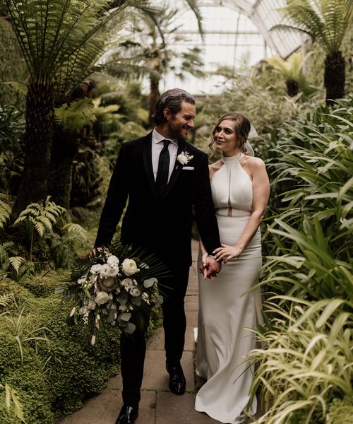 Elegant Tatton Park wedding with tropical flowers and halter neck dress