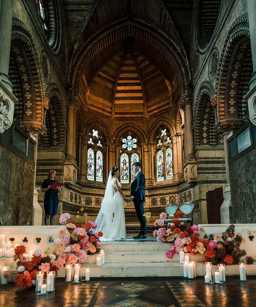 Church wedding ceremony with religious wedding readings.