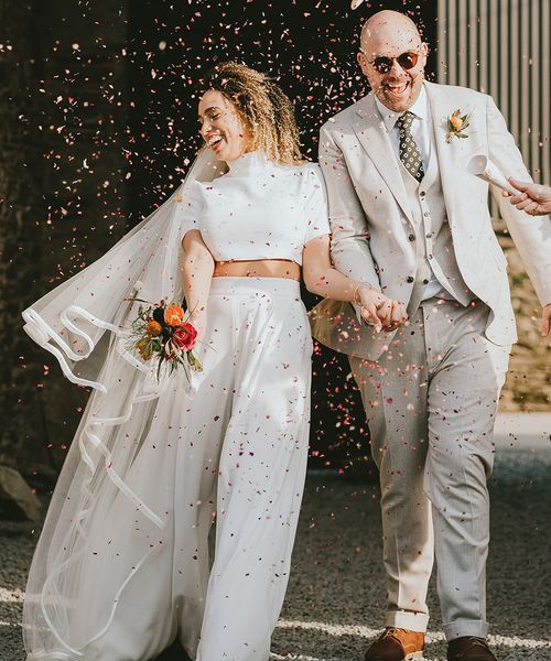 confetti moment for bride and groom