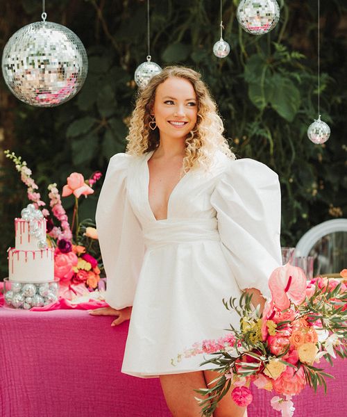 Polstrong Manor wedding with pink decor and bride in short puff sleeve wedding dress.