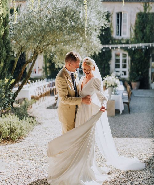 Château de Malliac destination wedding with green satin bridesmaid dresses and a bespoke Emma Beaumont bridal gown by Clara Cooper