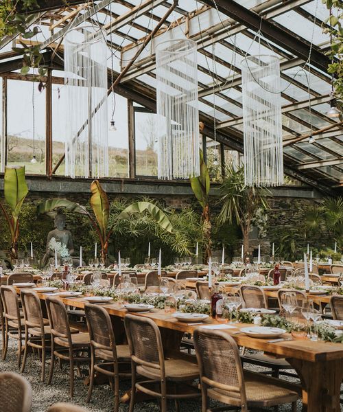 Anran Devon wedding venue decorated with macrame hanging chandeliers