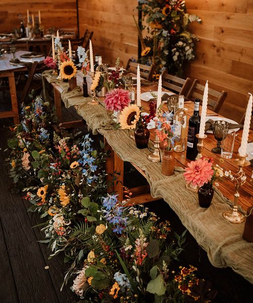 Seasonal flowers for rustic wedding tablescape.