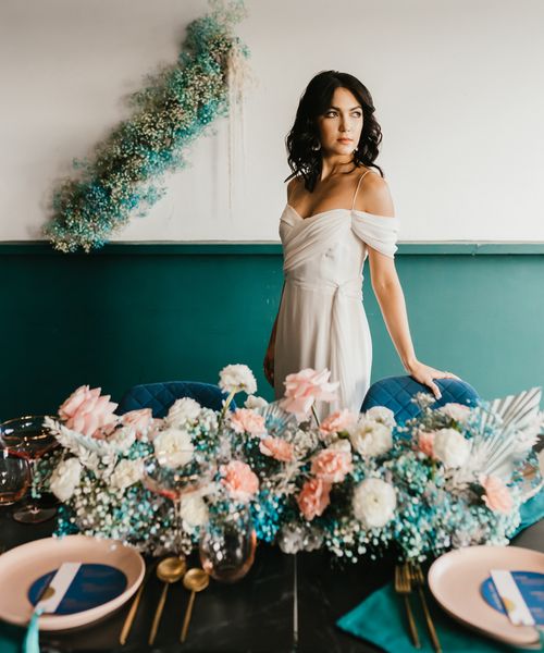 pink and teal wedding inspiration with gypsophila flowers, disco balls and stylish wedding dresses 