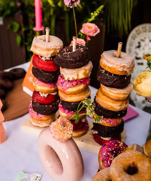 wedding dessert table with doughnuts