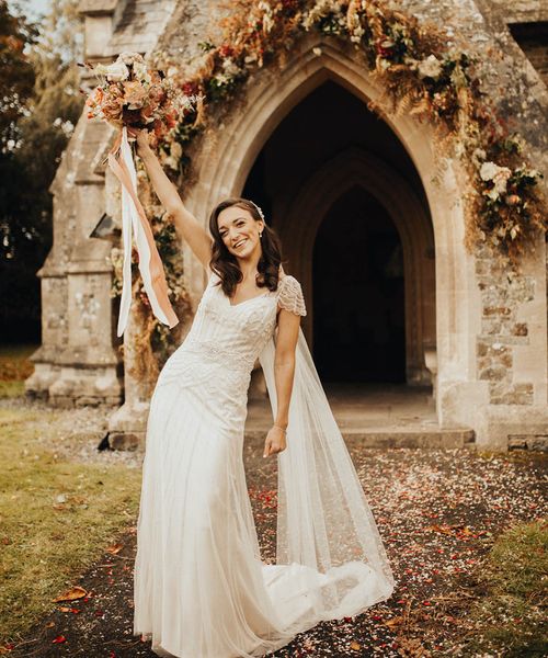 Bride in autumn wedding dress with beaded embellished decor