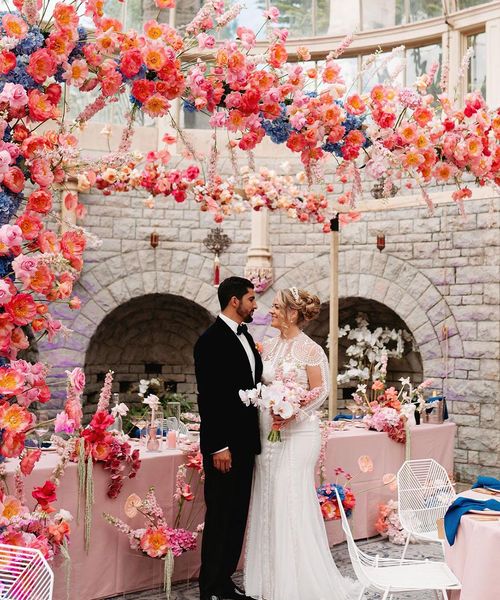 De Vere Tortworth Court wedding with pink flower decorations.