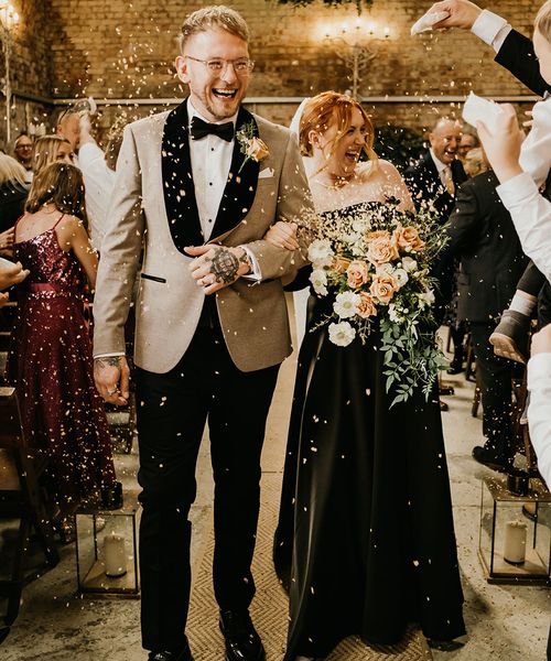 Botley Hill Barn in Surrey wedding with bride wearing black wedding dress