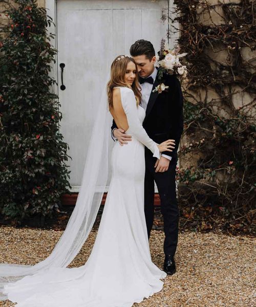 Emma Beaumont Wedding Dress for a Winter Wedding at Northbrook Park with Pampas Grass Floral Arrangements