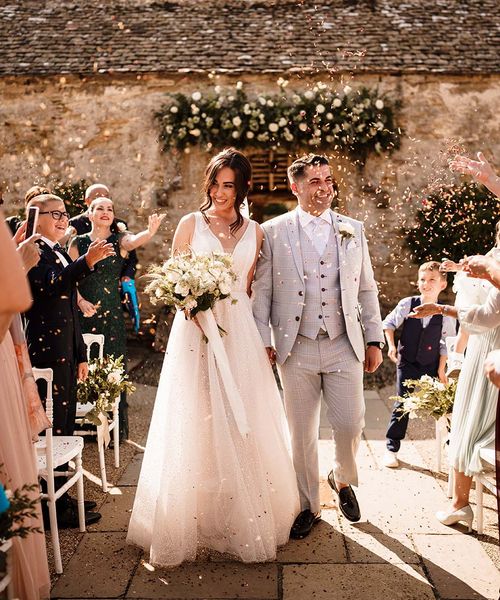 Breaking bread & kicking the bucket Bulgarian wedding traditions at Caswell House Cotswolds venue by Stephen Walker Photography