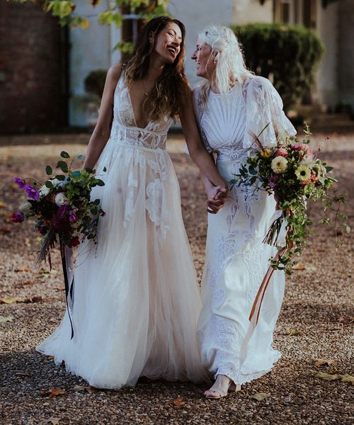 Aswarby Rectory wedding with two brides in boho lace wedding dresses