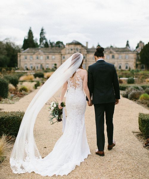 Luxurious Grantley Hall Wedding with elegant wedding cake, flowers and fashion