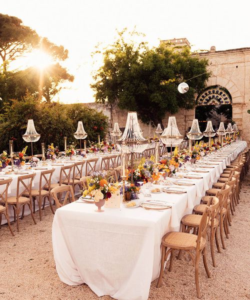 Chandelier installation for destination wedding in Puglia, Italy.