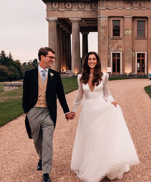 Mansion wedding at The Grange in Hampshire with the bride in a Sassi Holford pearl wedding dress.