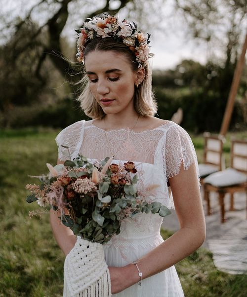 Bride wearing a dried flower headband for a boho wedding.