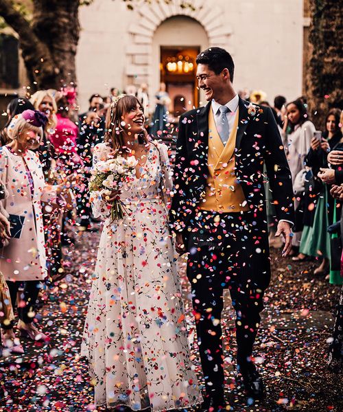 Crypt On The Green wedding with bright confetti exit