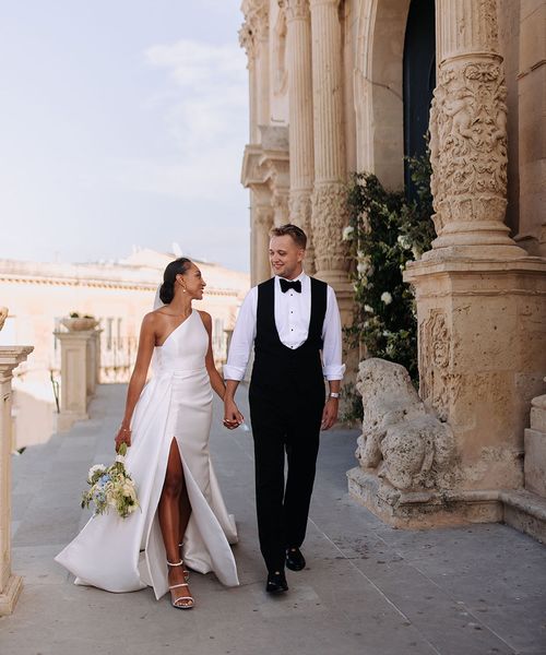 Stylish Jane Hill Bridal gown at Borgo Del Carato Italian destination wedding with blue bridesmaid dresses and flowers by Studio Westlake