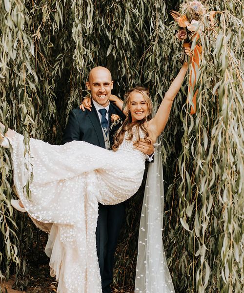 Duddon Mill Farm wedding with the bride in a lace wedding dress.