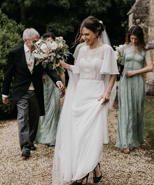 Classic Kelmarsh Hall wedding with green bridesmaid dresses, morning suits and joint speeches.