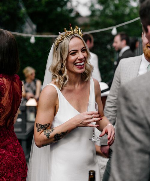 bride wearing a gold bridal crown