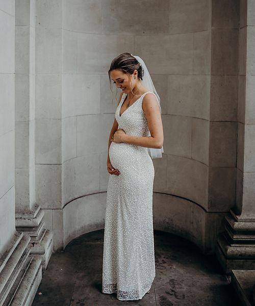 bride in sparkly sequin maternity wedding dress