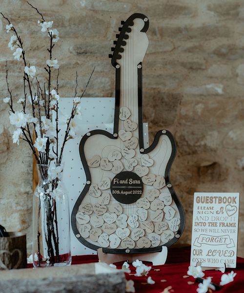 Guitar wedding guest book for gay wedding.