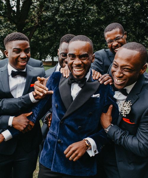 a group of men celebrating together for a stag party