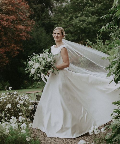 San Patrick wedding dress worn by bride for classic hotel wedding.