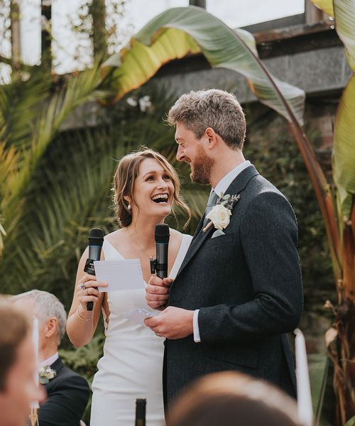 bride and groom performing their joint wedding speech