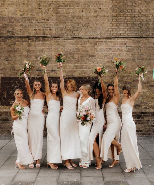 100 Barrington wedding with bridesmaids in neutral bridesmaid dresses