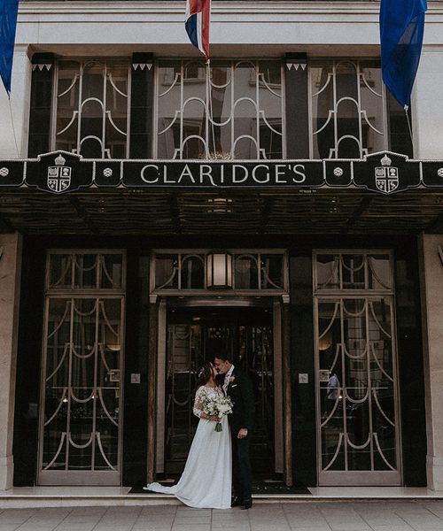 Claridge's wedding in London with black tie dress code and bride in maternity wedding dress.