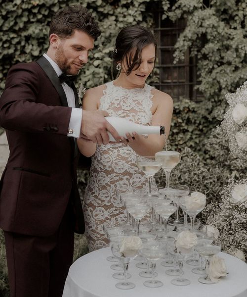 champagne tower at intimate dinner party wedding